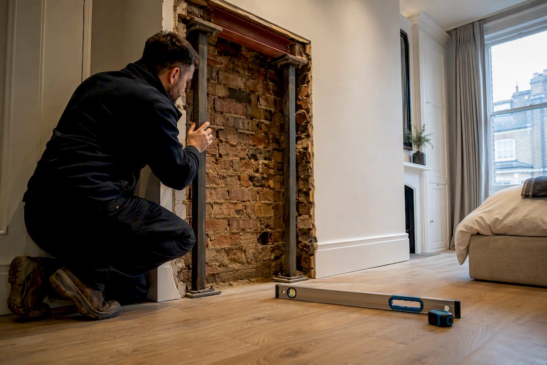 Survey of exposed chimney breast in London townhouse