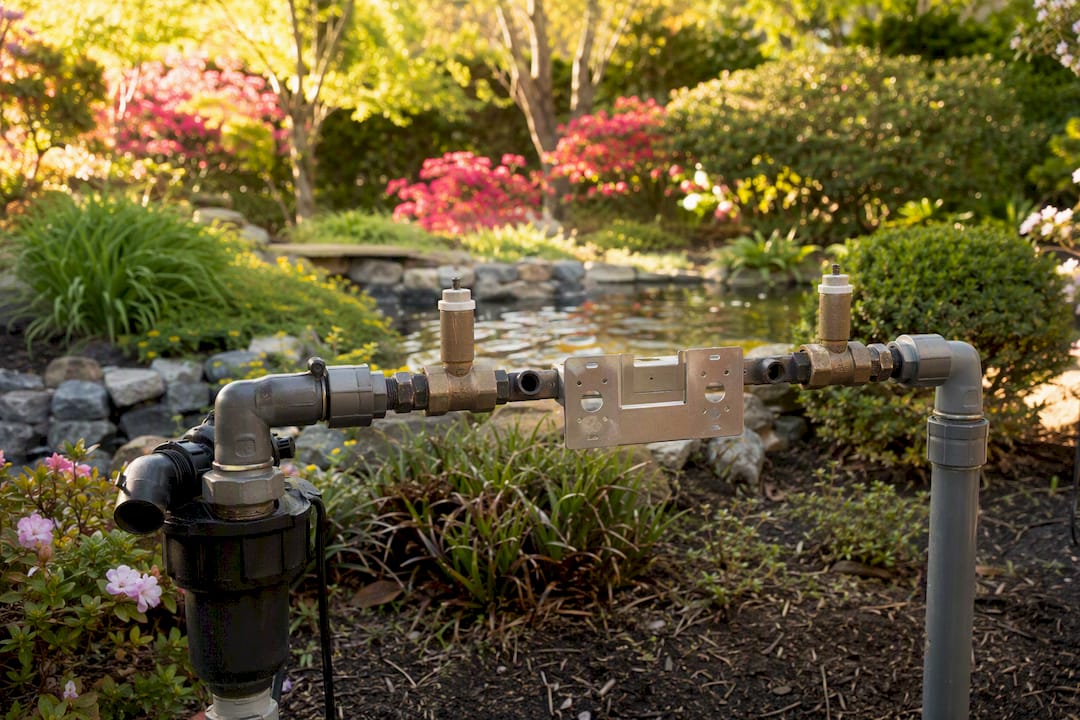Irrigation system plumbing with fertilizer injector