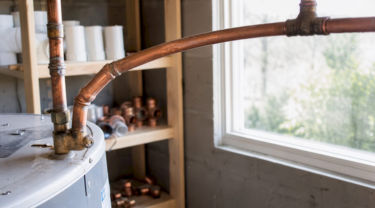 Copper pipes bent from thermal expansion