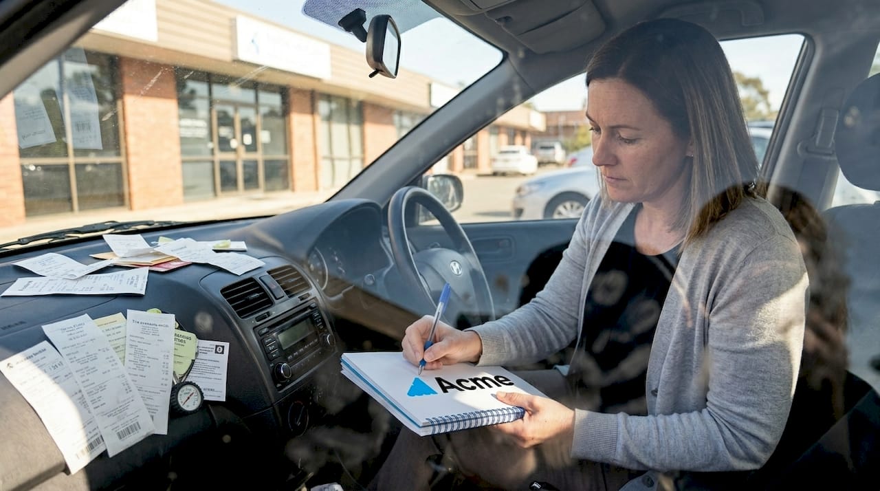 Manager updating logbook for company car use