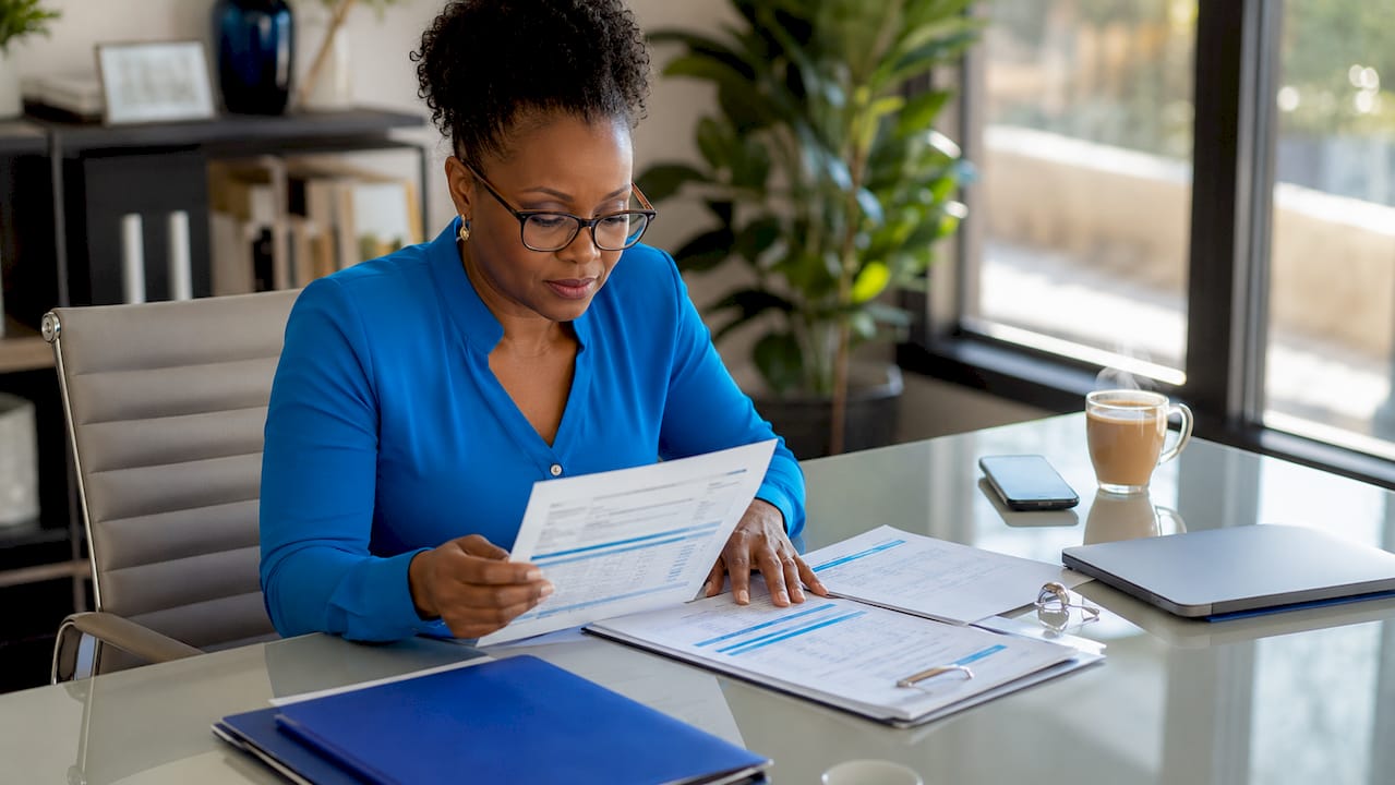 Businesswoman reviewing SARS compliance documents