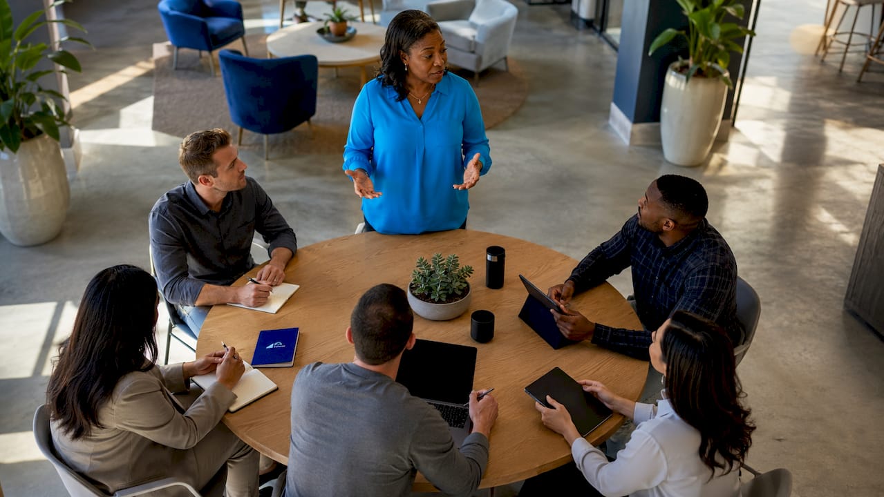 Diverse business team engaged in leadership meeting