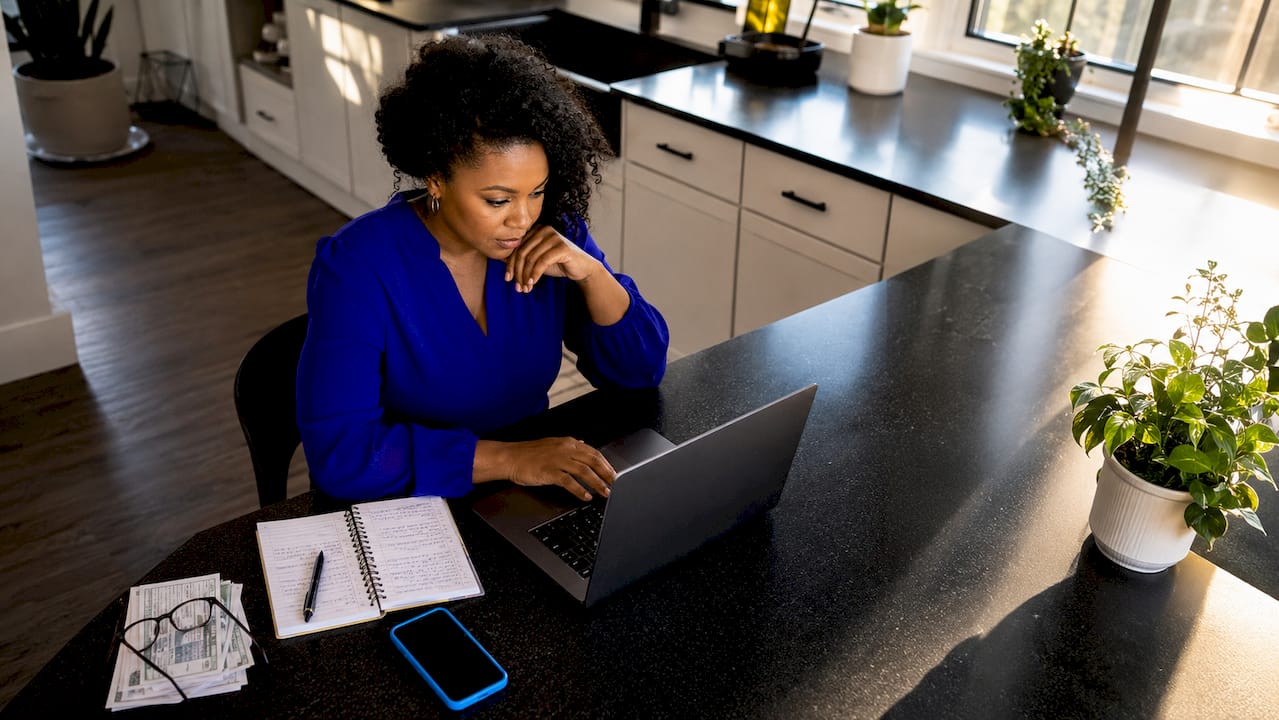 Small business owner activating cybersecurity feature