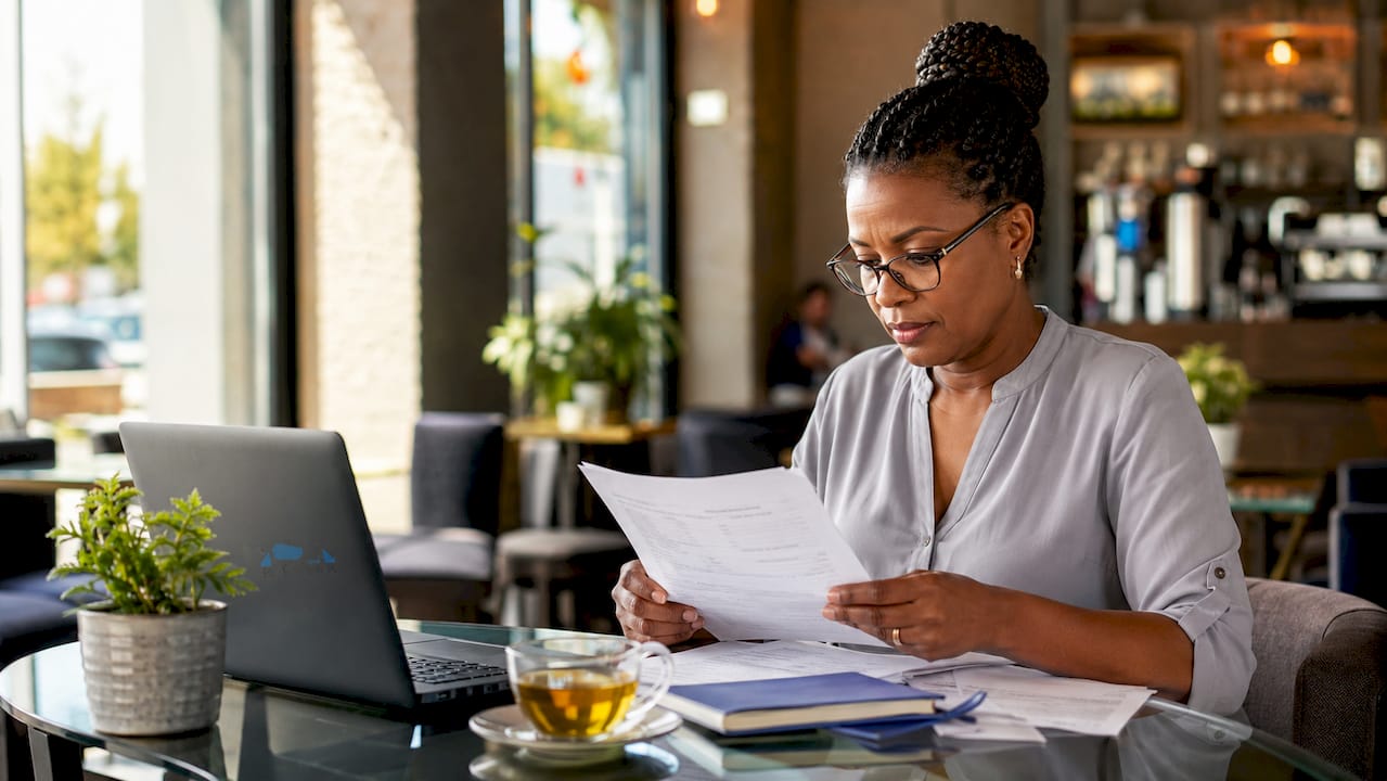 South African SME owner reviewing tax deduction documents