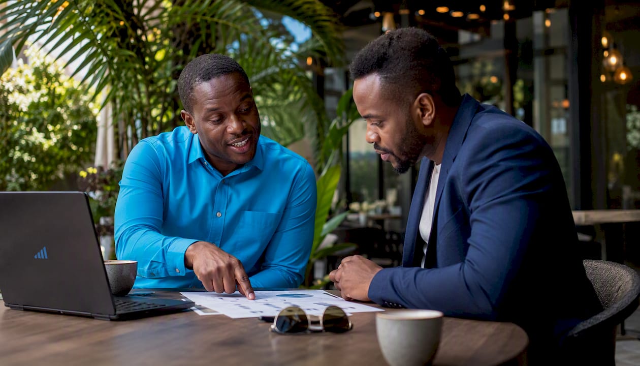 Entrepreneurs discussing accounting firm proposals