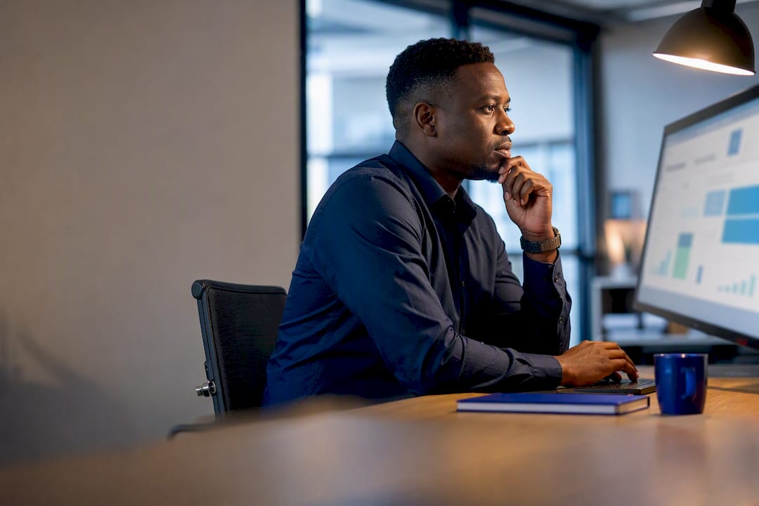 Startup finance lead reviewing cloud bookkeeping dashboard