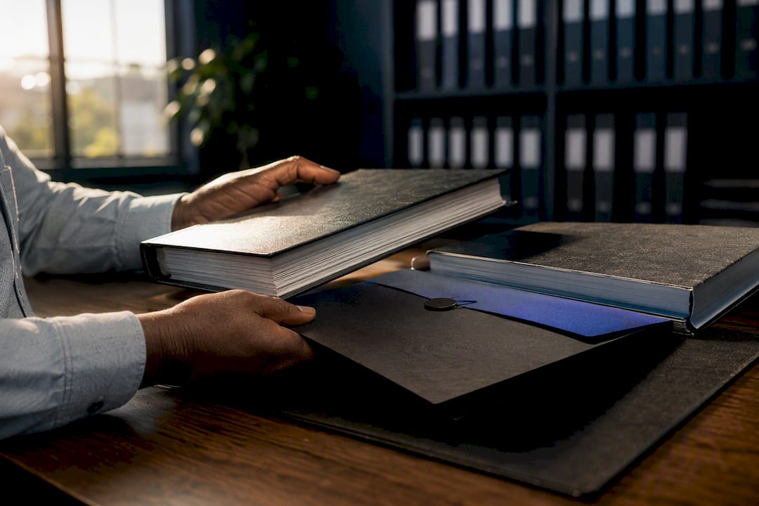 Accountant reviewing financial ledgers
