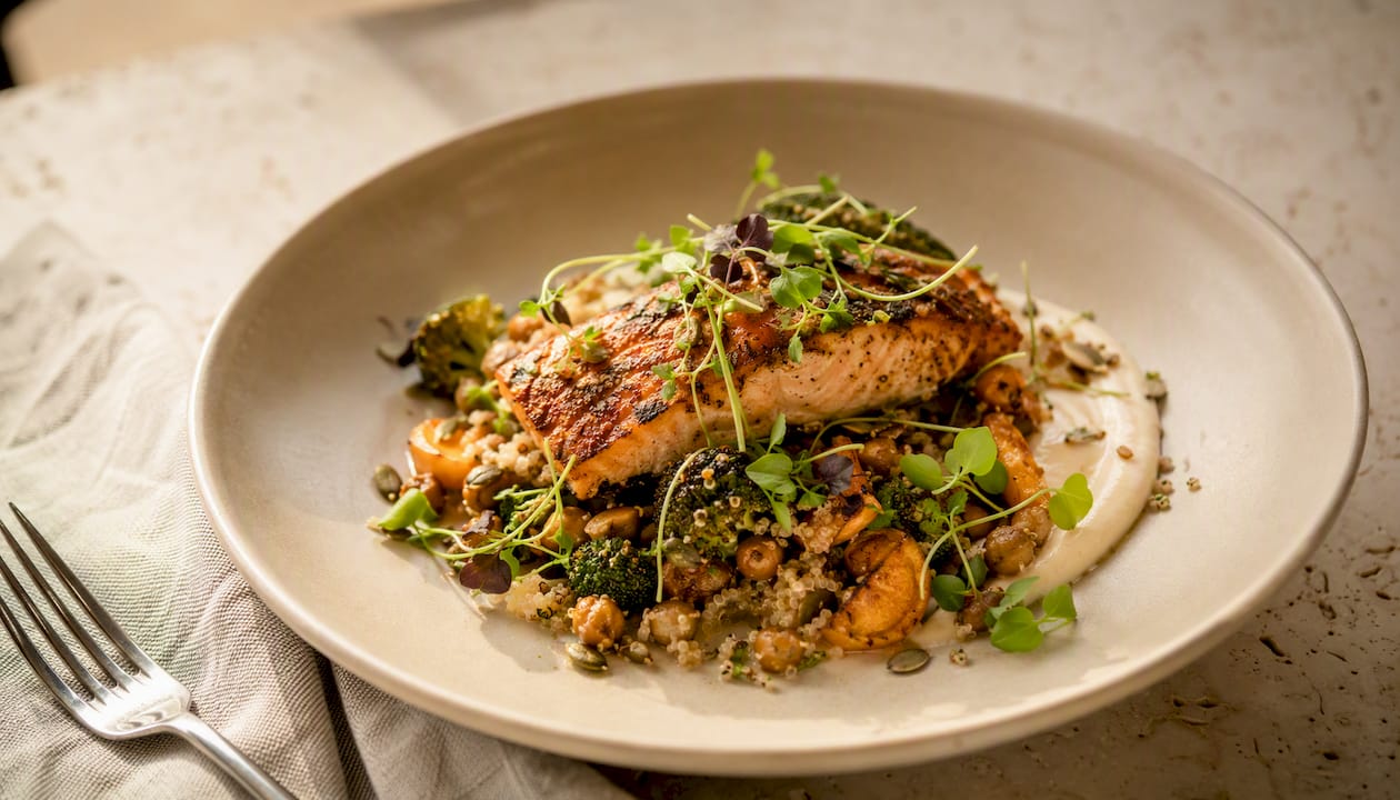Styled plated dish on matte ceramic plate