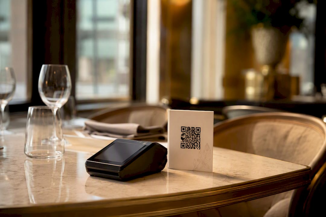 Pay at table hardware with QR code card on table