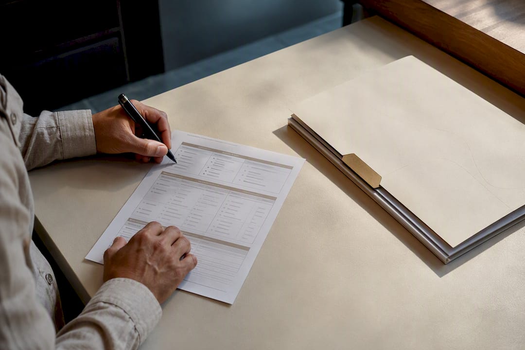 Manager reviewing hospitality integration worksheet