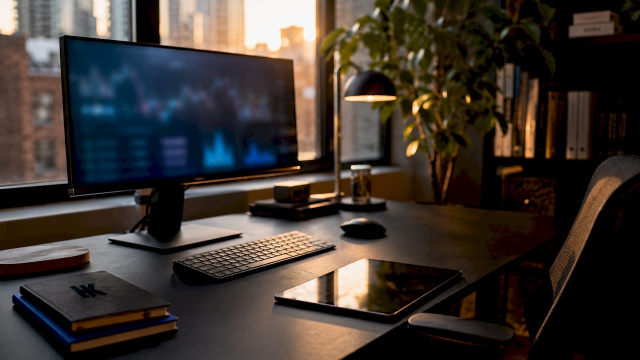 Workstation with abstract metrics on screen