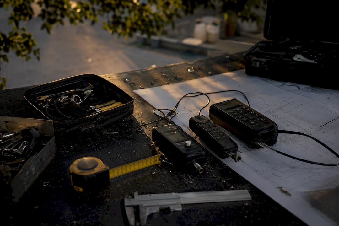 Workshop bench with diagnostic tools and blueprint