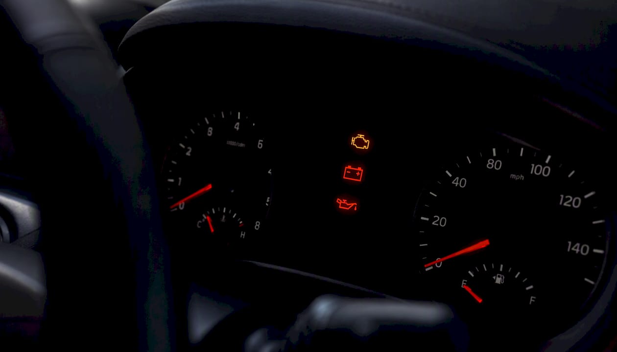 Close-up of car dashboard warning lights