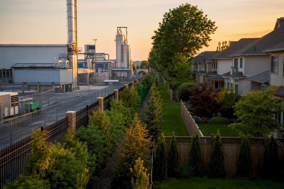 Industrial site buffer separating residential neighborhood