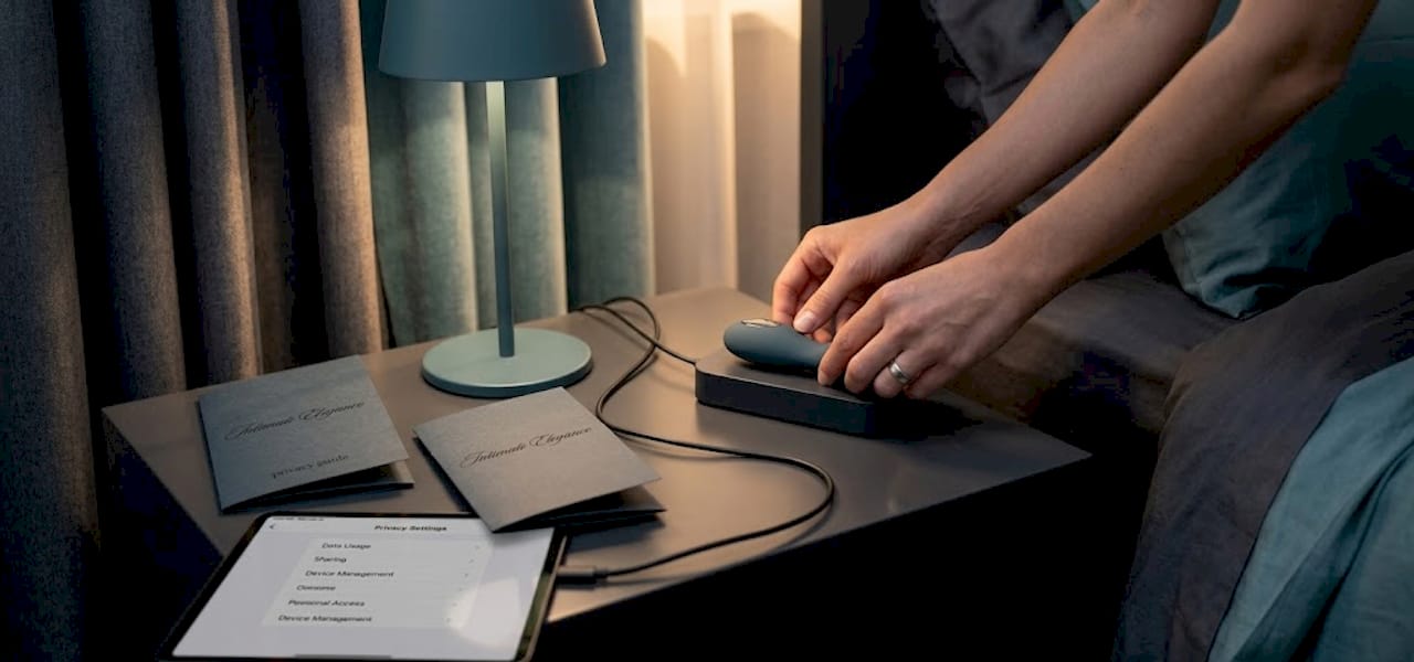 Hands setting device on charging station, privacy focus