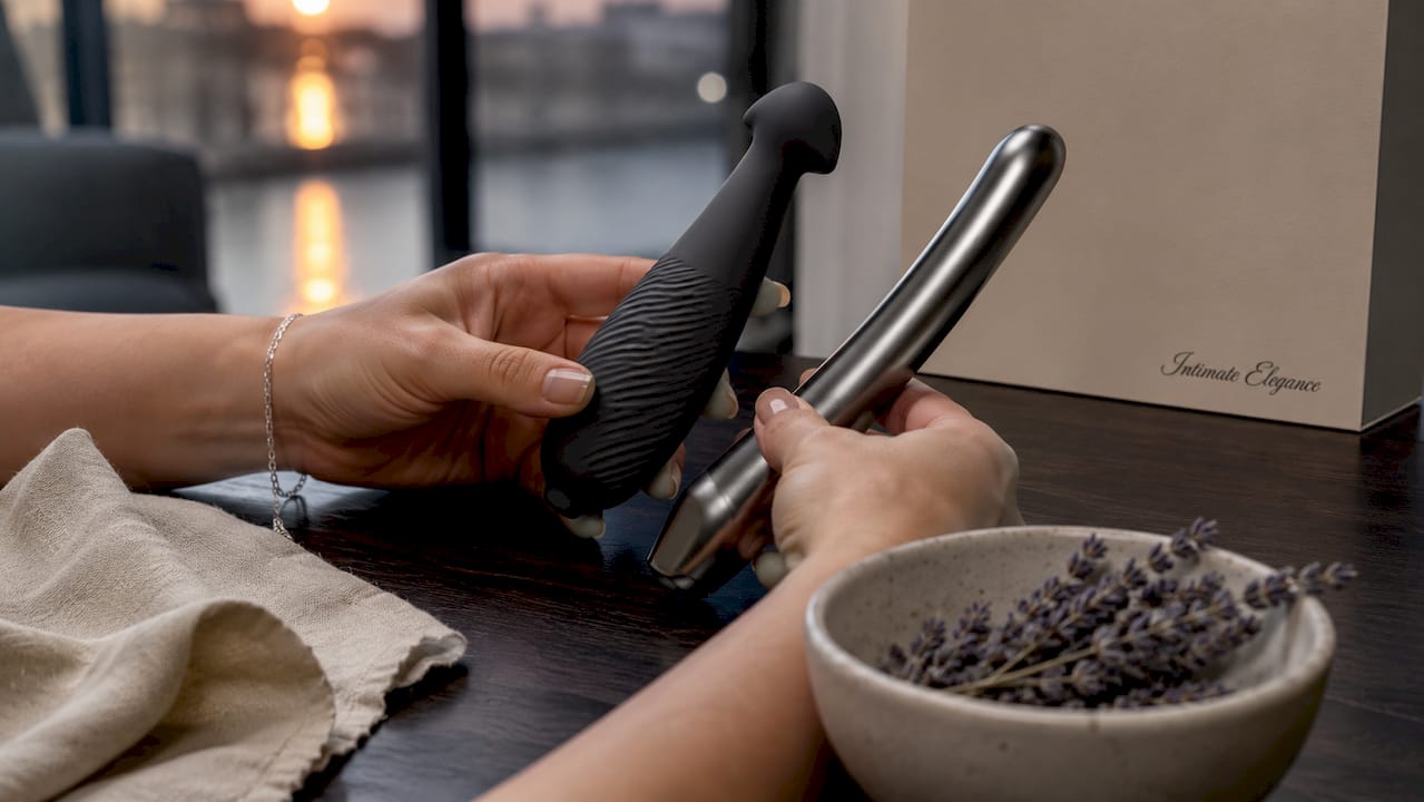 Hands demonstrating premium intimate wellness products