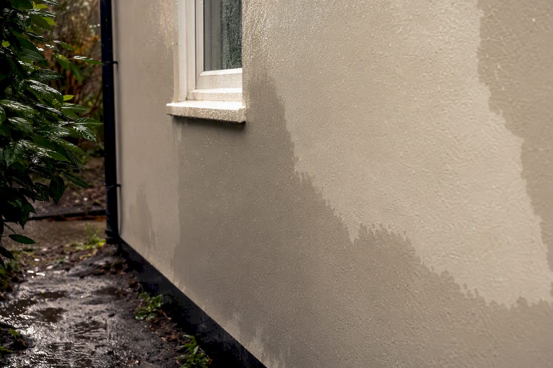 Wet paint drying delayed by rainy weather