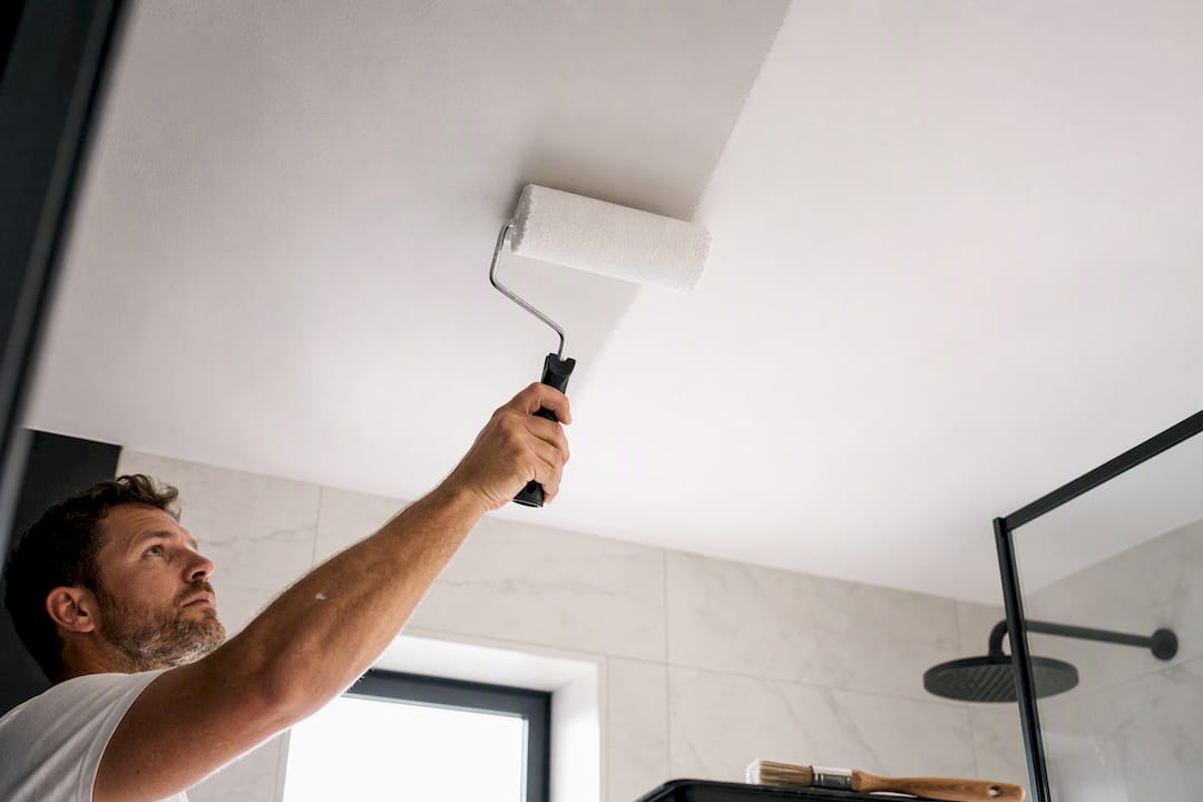 Applying matt paint to a ceiling