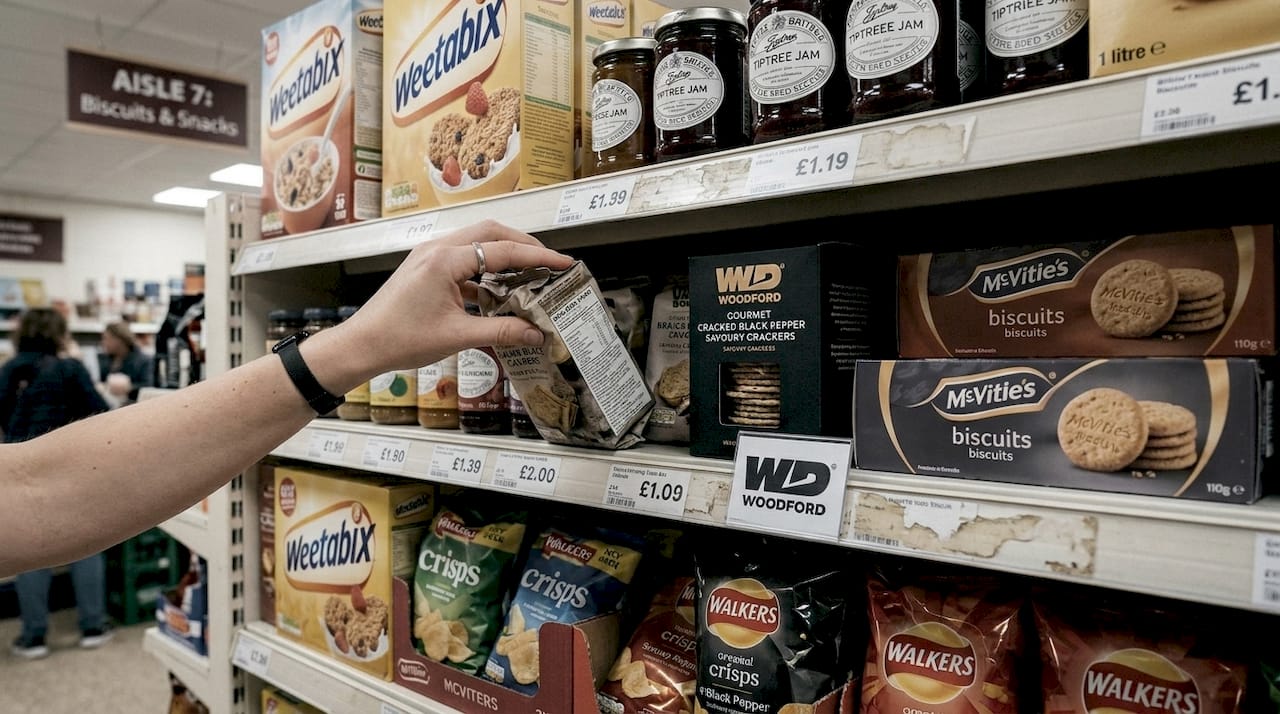 Food packaging choices on busy UK grocery shelf