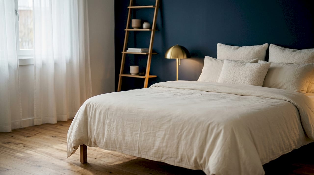 Close-up of lamp and outlet in calm executive bedroom