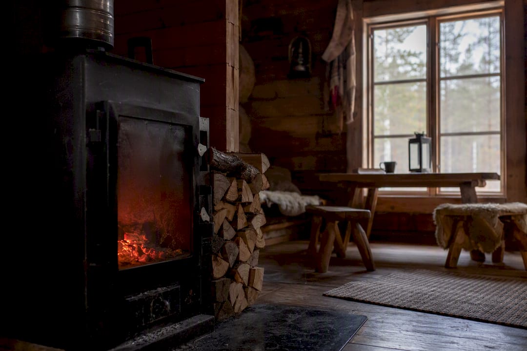 Cozy interior of a wilderness hut with stove