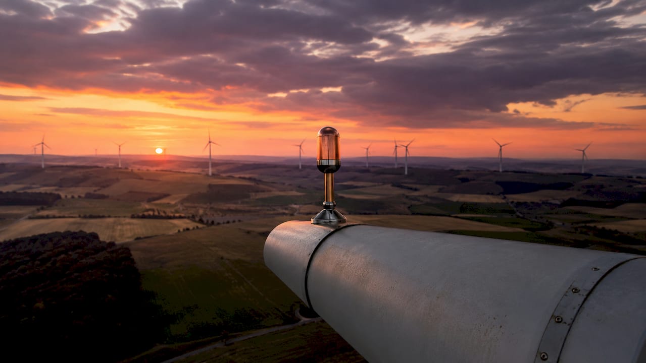 Close-up of copper lightning receptor on wind turbine blade