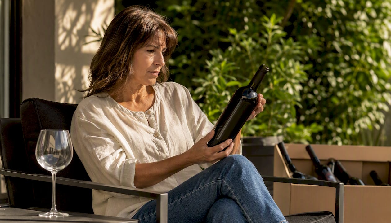 Hands typing to buy wine during flash sale