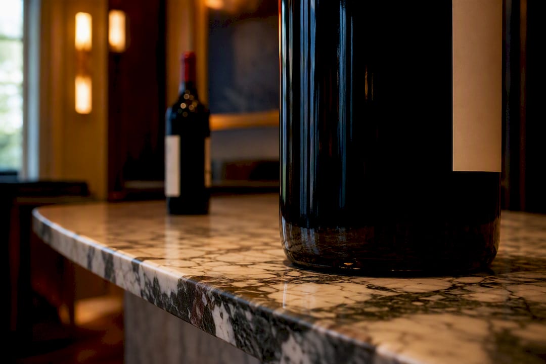 Large-format wine bottle on auction table