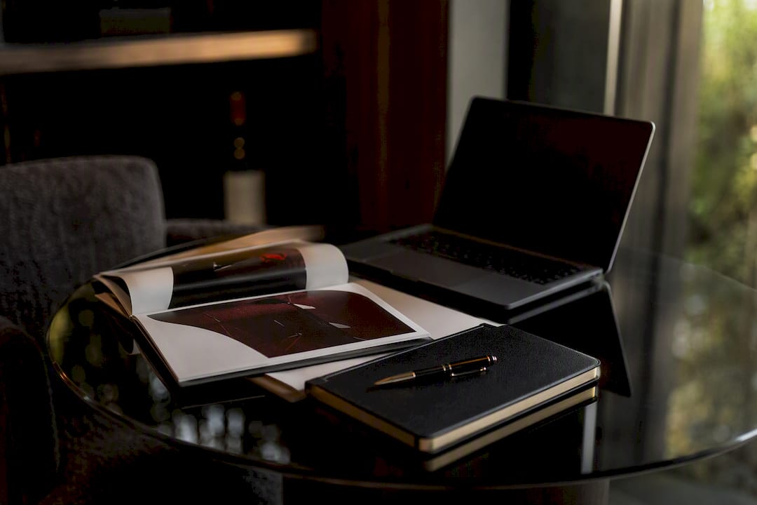 Corporate wine gift sales collateral on desk