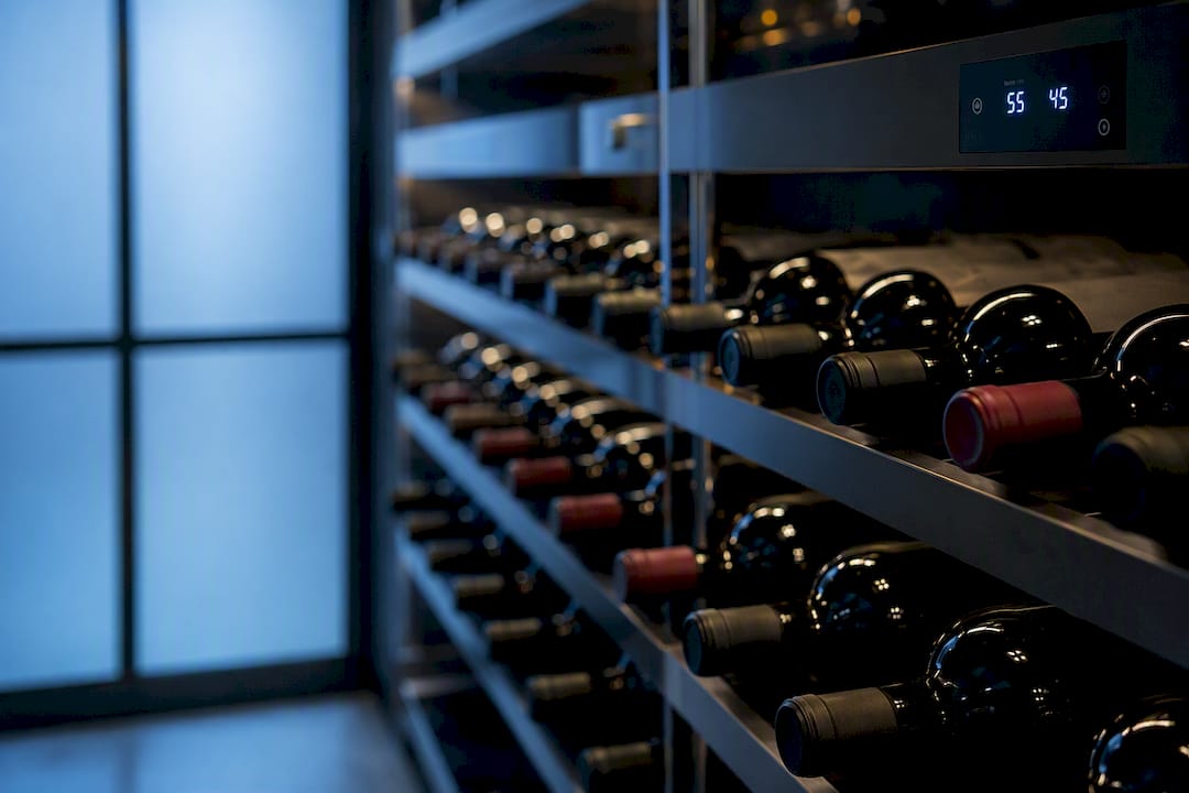 Unopened wine bottles in temperature-controlled cellar