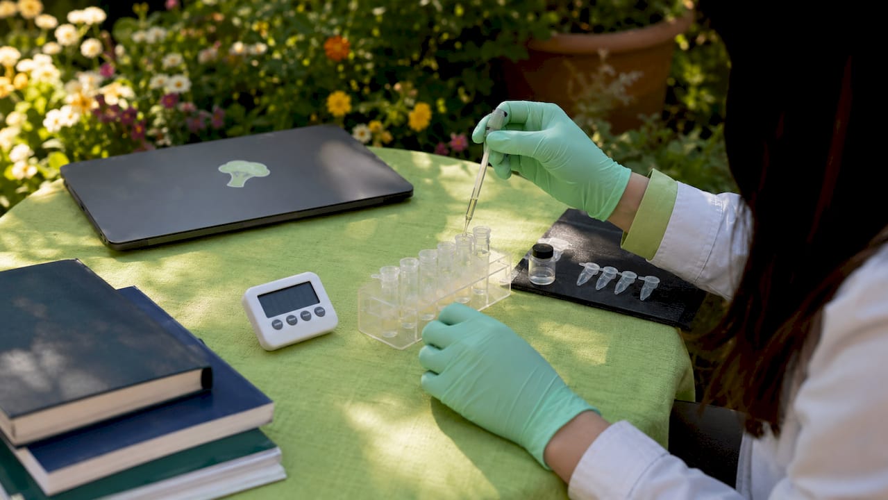 Researcher handling lab samples for nutrient digestion