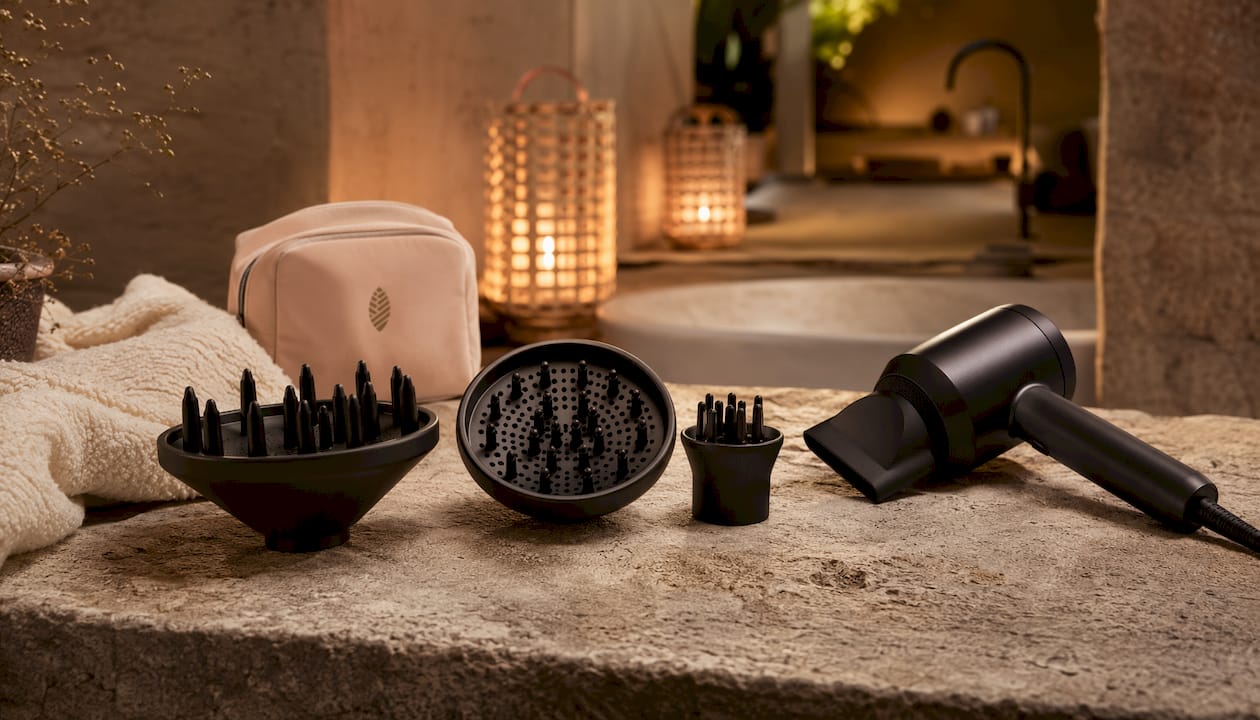 Different hair dryer diffuser types on counter