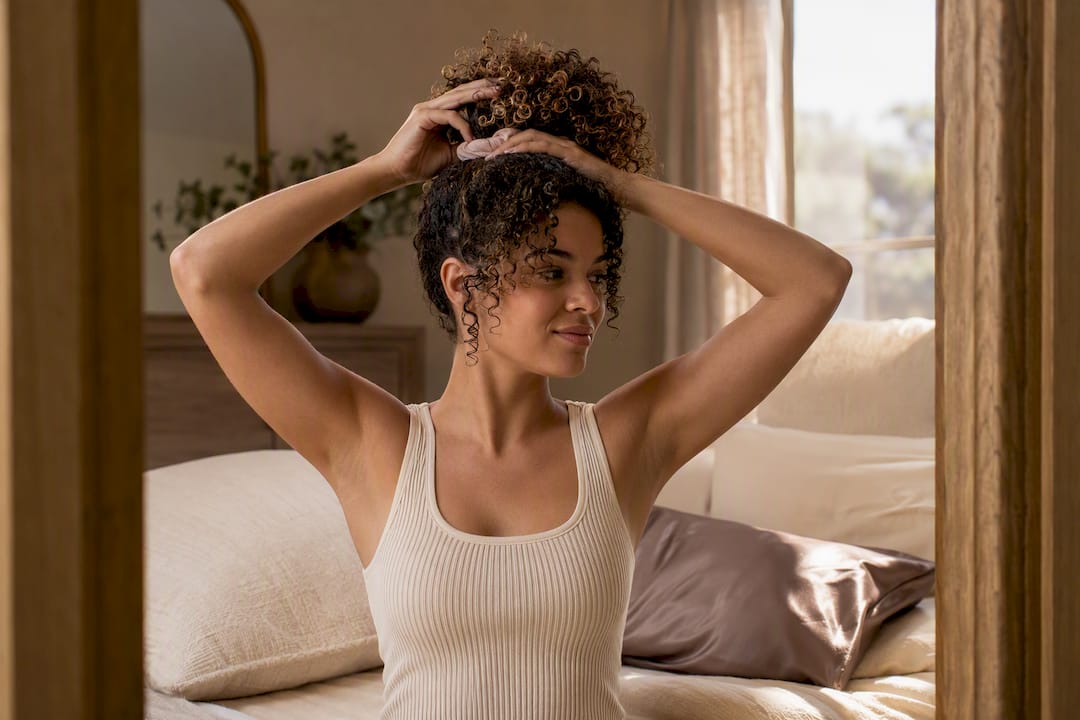 Curly hair gathered loosely for overnight protection