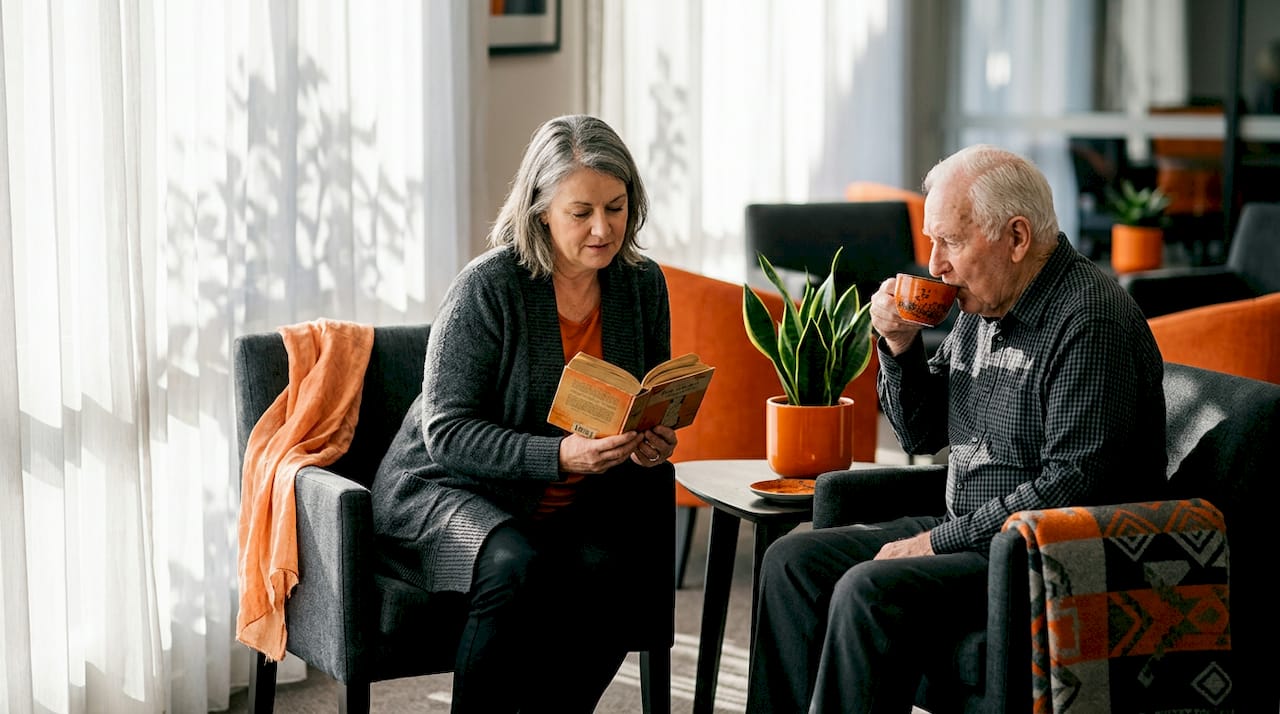 Family visiting in care home lounge