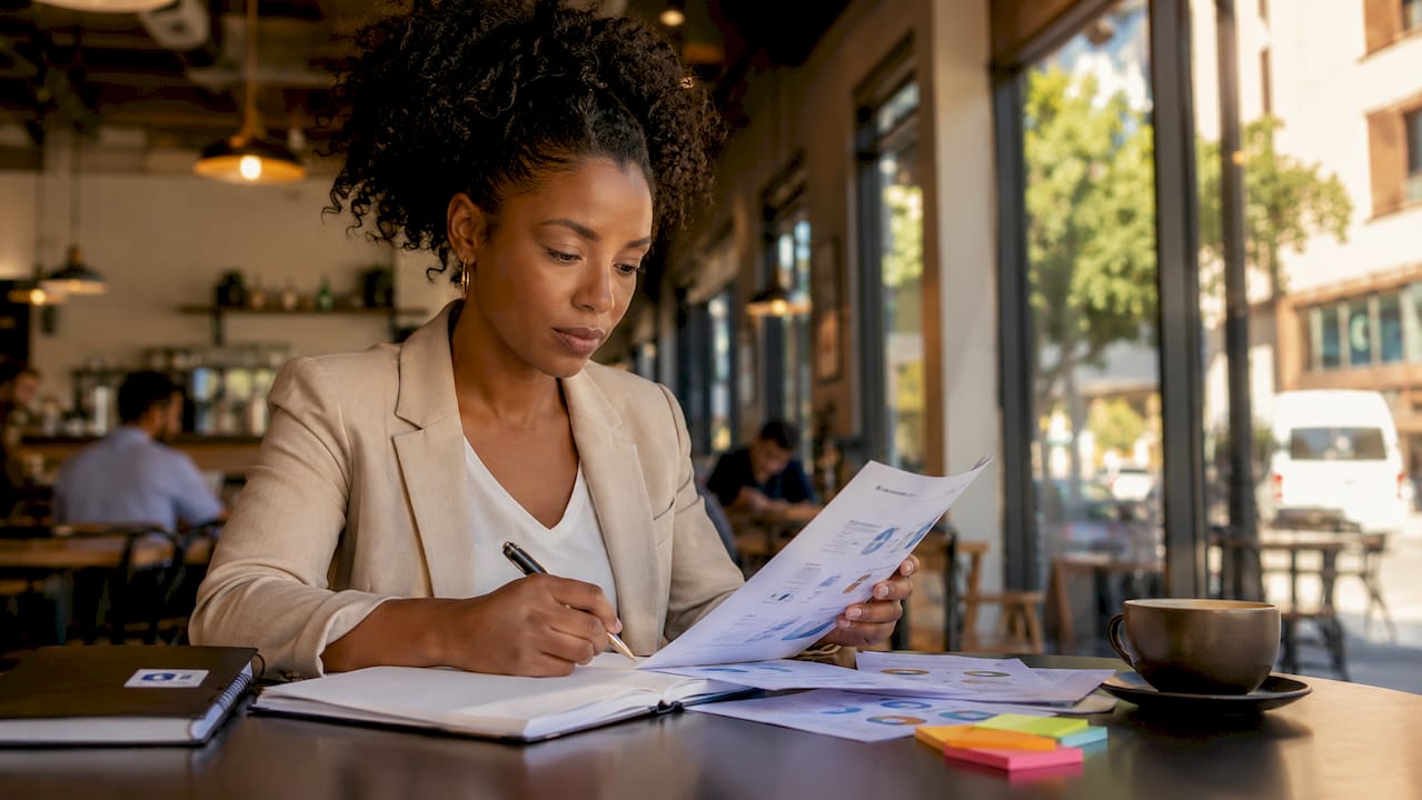 Woman reading explainer content at desk