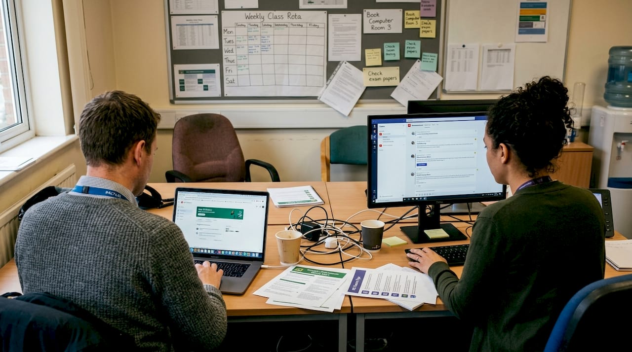 Teachers reviewing Google Classroom and Teams platforms