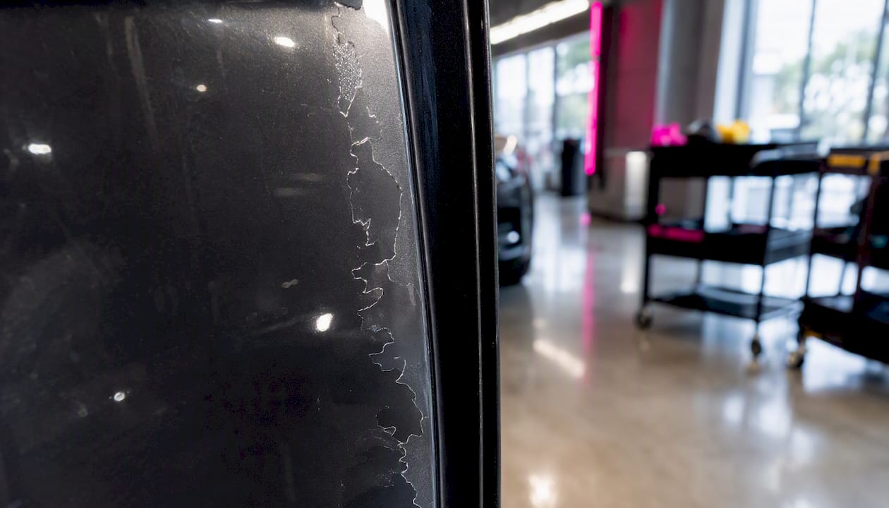Peeling clearcoat on car roof panel