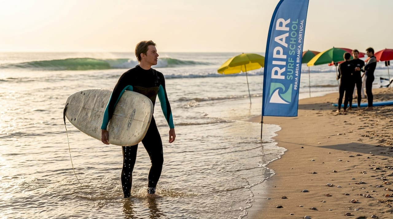 Surfer watching clean green wave approaching
