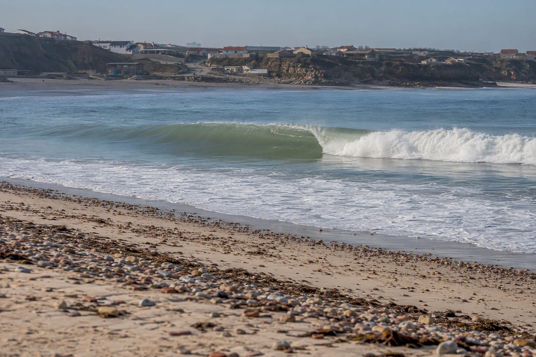 Mid-tide waves breaking over sandbanks