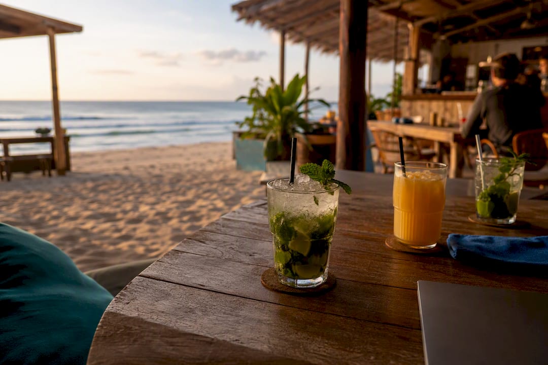Oceanfront bar tables with drinks and sea view