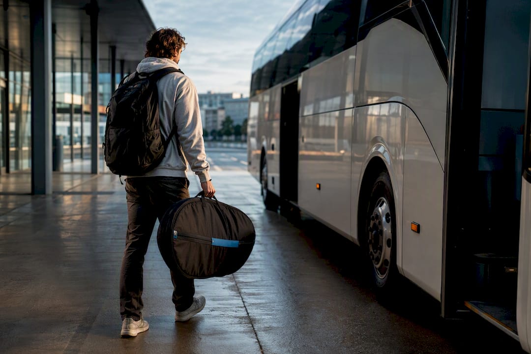 Traveler boarding coach from Lisbon