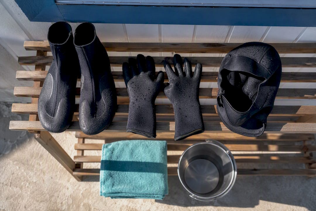 Surf boots gloves and hood arranged