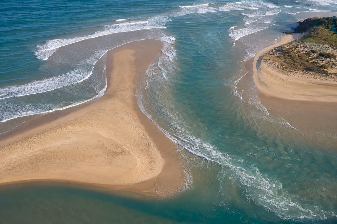 Aerial view of changing Areia Branca sandbar