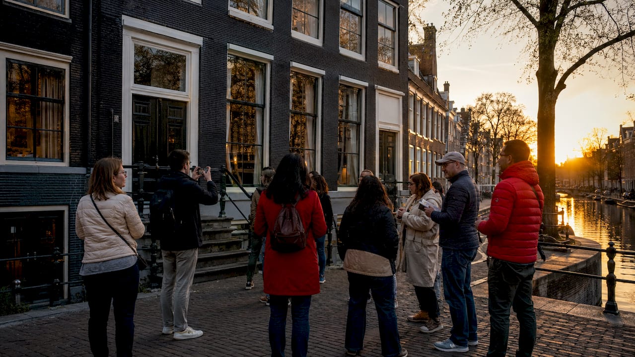 Visitors outside Anne Frank House building in Amsterdam