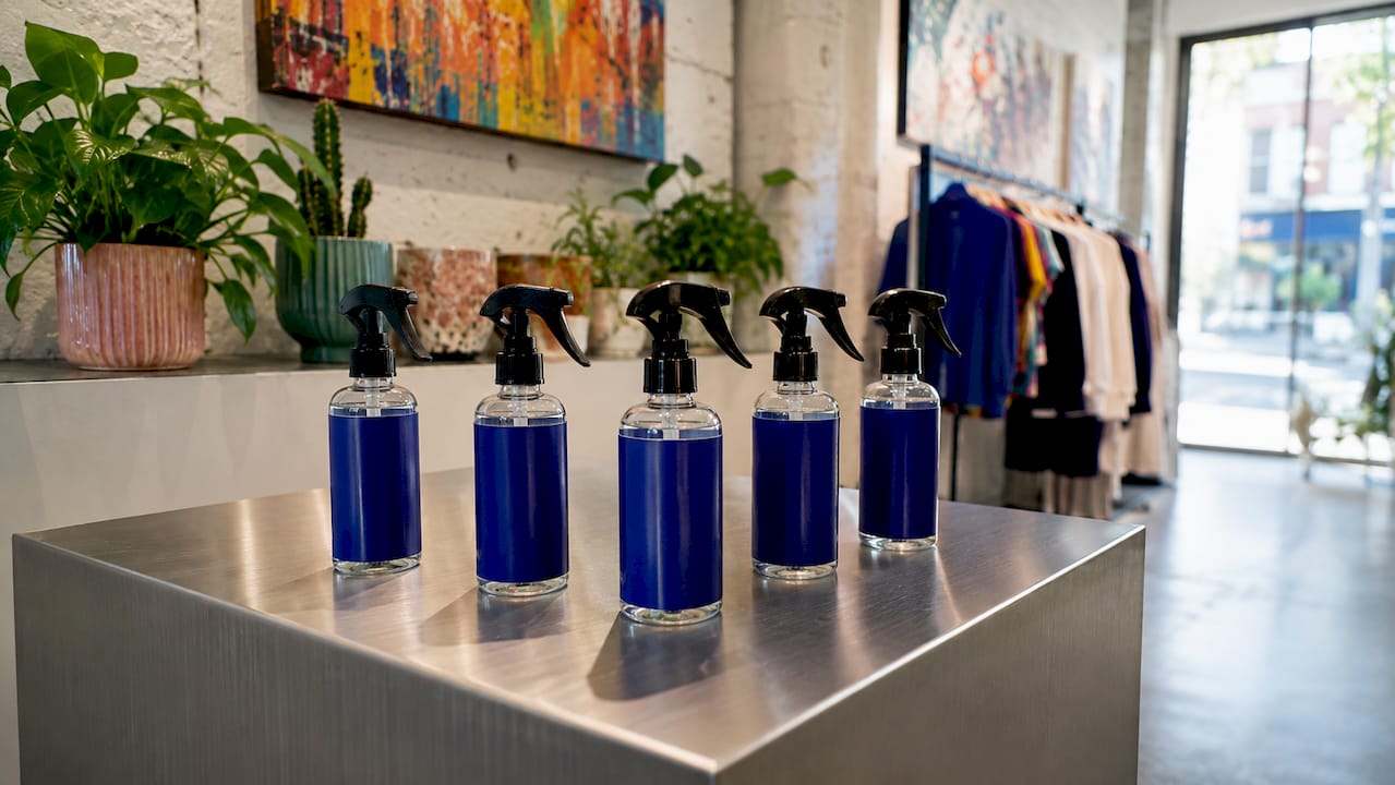 Display of premium odor treatment bottles