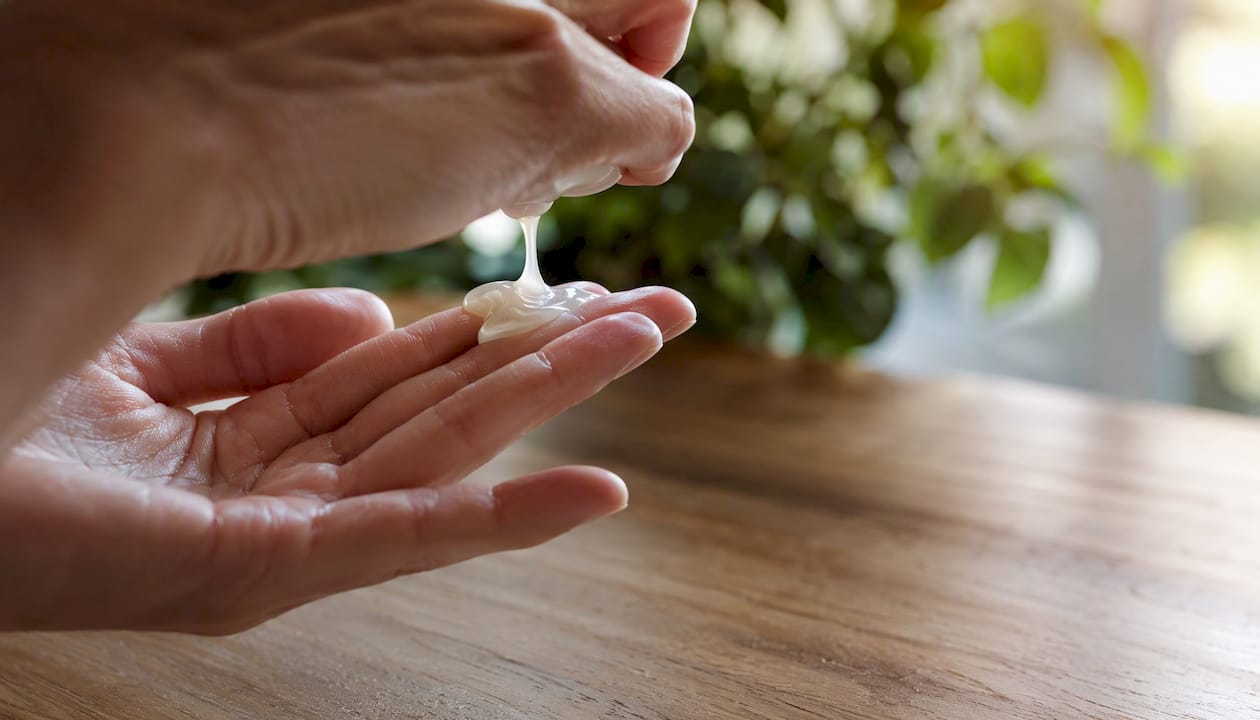 Close-up of hand with creamy gentle cleanser