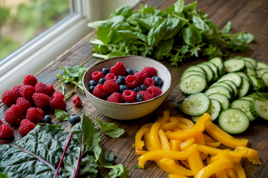 Antioxidant-rich fresh vegetables and berries overhead