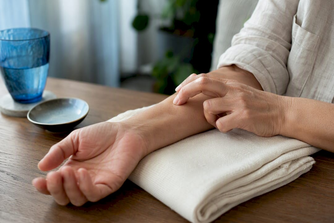 Inner forearm patch test before facial treatment