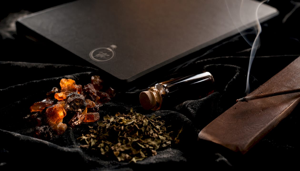 Flat lay of oud amber patchouli ingredients