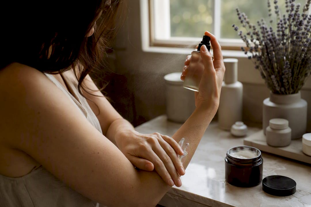 Applying fragrance cream and hair mist